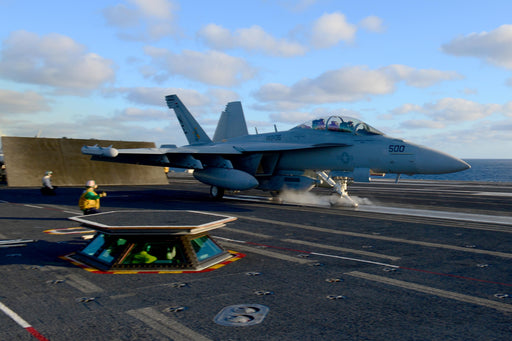 An EA-18G Growler assigned to the Gauntlets of Electronic Attack Squadron (VAQ) 136 launches from the flight deck of the aircraft carrier USS Ronald Reagan (CVN 76)