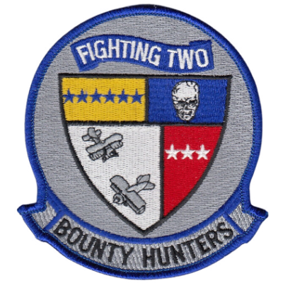 Circle patch with bottom banner with text "bounty hunters".  Grey background with blue outline.