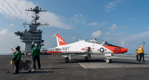 A U.S. Navy T-45C Goshawk aircraft assigned to Training Squadron (VT) 9 taxis aboard the flight deck of the aircraft carrier USS Harry S. Truman 